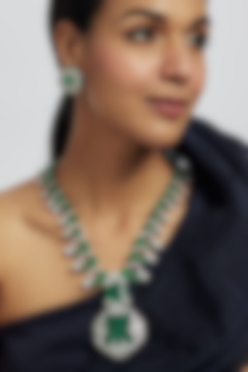 White Finish Emerald Green Zircon Long Pendant Necklace Set by Moh-Maya by Disha Khatri at Pernia's Pop Up Shop